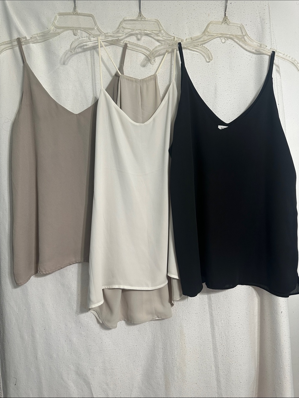 Three large camisole blouses